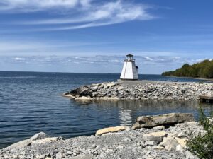 Manitoulin Island Lighthouse with whiskered clouds above